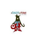 A Touch of Home Childcare company logo