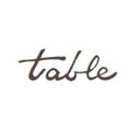 The Table company logo