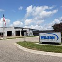 Wilson Steel-Fab and Machine company logo