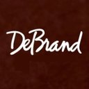 DeBrand Fine Chocolates company logo