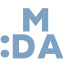 Manhattan Dental Arts company logo