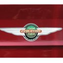 Evolution Custom Coach company logo