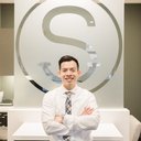 Smiles Orthodontics company logo