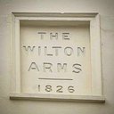 The Wilton Arms company logo