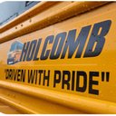 Holcomb Bus company logo