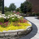 Warren’s Landscaping company logo